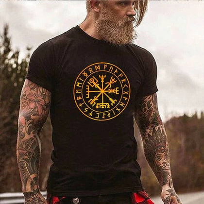 Modern Viking wearing a T shirt with Vegvisir compass and Rune symbols