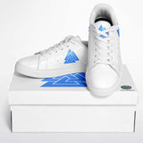 A pair of white low-top sneakers with blue geometric triangular logos on the sides, displayed on top of a white shoebox against a clean white background.