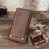 Brown leather wallet with open view on a wooden surface 