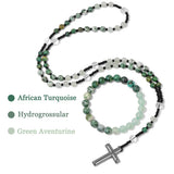 Beaded necklace with cross pendant on a white background, featuring African Turquoise, Hydrogrossular, and Green Aventurine beads.