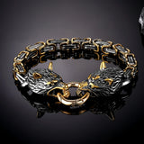 Gold and silver bracelet with intricate design on a dark background