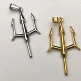 Silver and gold trident-shaped pendants on a white background