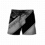 Black and gray shorts with circuit board design on a white background