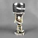 Decorative goblet with a skeleton design and text on a white background