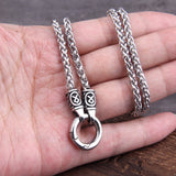 Two silver chains with clasp on a hand