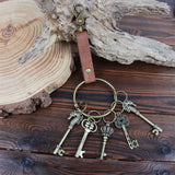 Keychain with vintage-style keys on a wooden surface