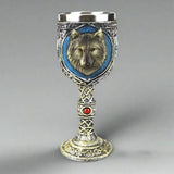Copa de acero inoxidable con cabeza de lobo y taza de café