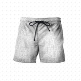 White shorts with black geometric pattern on a white background