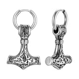 Pair of silver Mjällnir earrings on a white background