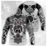 Hoodie with intricate black and white designs on a textured gray background