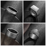 Collage of four black metal rings with different designs on a textured dark surface.