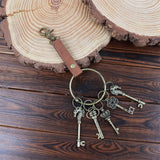 Keychain with vintage-style keys on a wooden surface