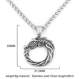 Silver dragon pendant necklace with measurements on a white background