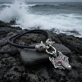 Black braided leather necklace with silver horse head pendant on a white background