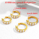 Gold hoop earrings with embedded stones, shown in two sizes on a white background.