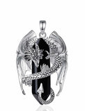 Dragon pendant with black stone on a white background