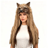 Woman wearing a wolf headpiece with long fur on a white background