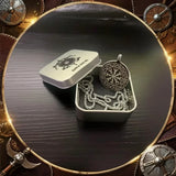 Viking-inspired jewelry set with pendant and chain in a box, surrounded by decorative Viking elements.