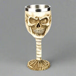 Copa de acero inoxidable con cabeza de lobo y taza de café