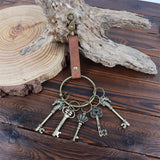 Keychain with vintage-style keys on a wooden surface