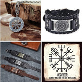 Collection of Viking Runes jewelry including necklace, bracelet, and wristbands on a wooden and stone background.