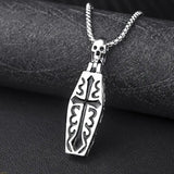 Silver pendant with skull design on a  coffin pendant that opens and inside   lies a skeleton 