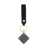 Vegvisir Keychain with black strap and decorative pendant on a white background