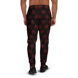  black jogger-style pants with a repeating red circular viking symbol pattern